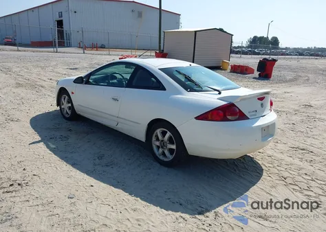 2000 Mercury Cougar V6 из США, поврежденный, VIN 1ZWFT61L8Y5634130